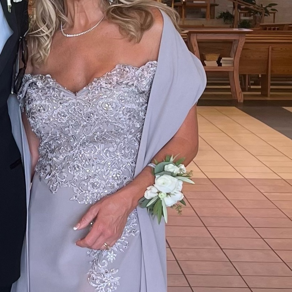 Exquisite Gown by Rina diMontella with matching wrap.